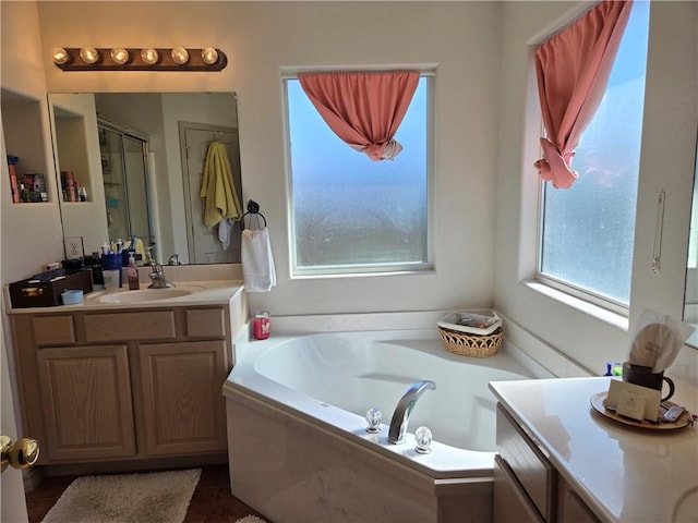 bathroom with vanity and plus walk in shower