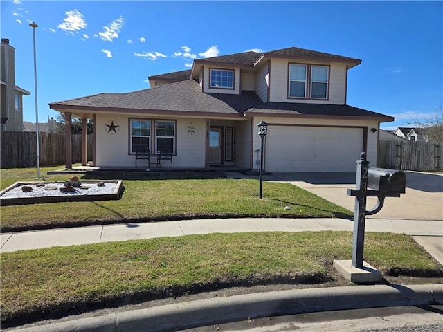 view of front of house featuring a front yard, a garage, and a porch