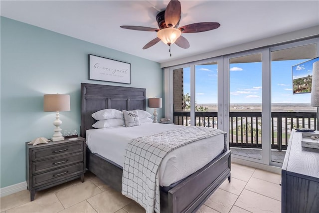 bedroom with baseboards, access to exterior, and ceiling fan