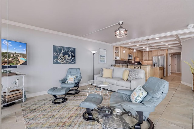 living area with baseboards, ornamental molding, and light tile patterned floors