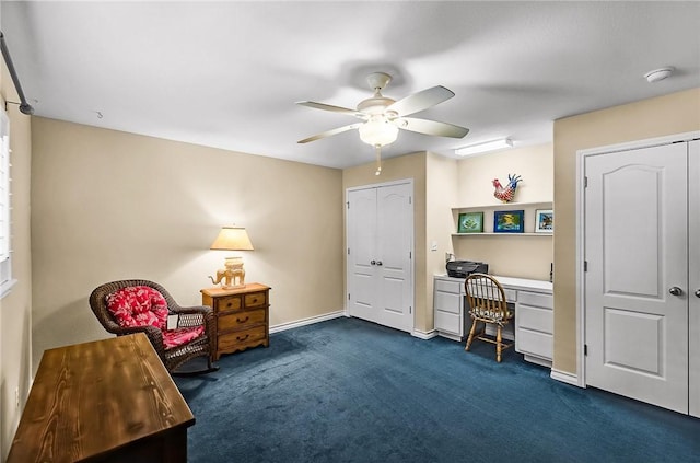 466 Coral, Corpus Christi, TX 78411 - home office with a ceiling fan, dark colored carpet, and built in desk