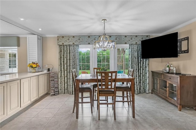 466 Coral, Corpus Christi, TX 78411 - dining room with crown molding, a chandelier, and light tile patterned floors