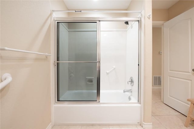 466 Coral, Corpus Christi, TX 78411 - bathroom featuring tile patterned flooring and shower / bath combination with glass door