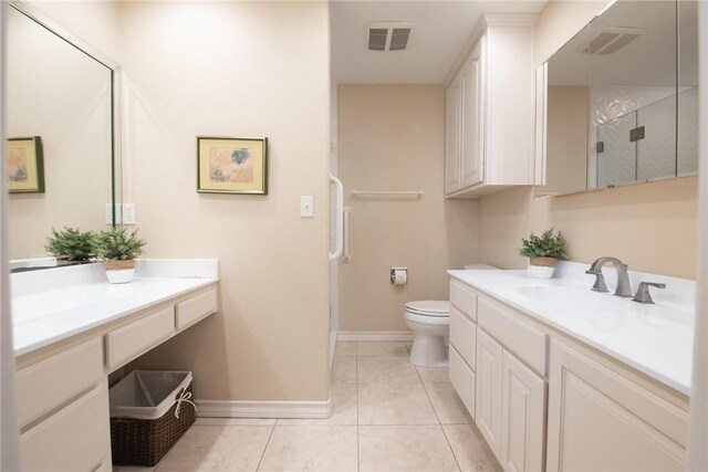 466 Coral, Corpus Christi, TX 78411 - full bathroom with vanity, an enclosed shower, and tile patterned flooring