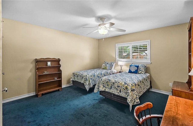 466 Coral, Corpus Christi, TX 78411 - bedroom featuring a ceiling fan and carpet floors