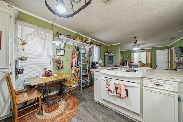 kitchen with white cabinetry and crown molding