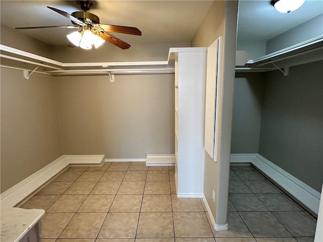 walk in closet featuring ceiling fan and light tile patterned floors