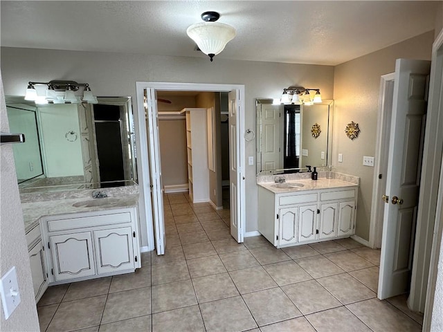 bathroom featuring vanity and tile patterned floors