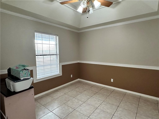 unfurnished room featuring crown molding, ceiling fan, and light tile patterned flooring