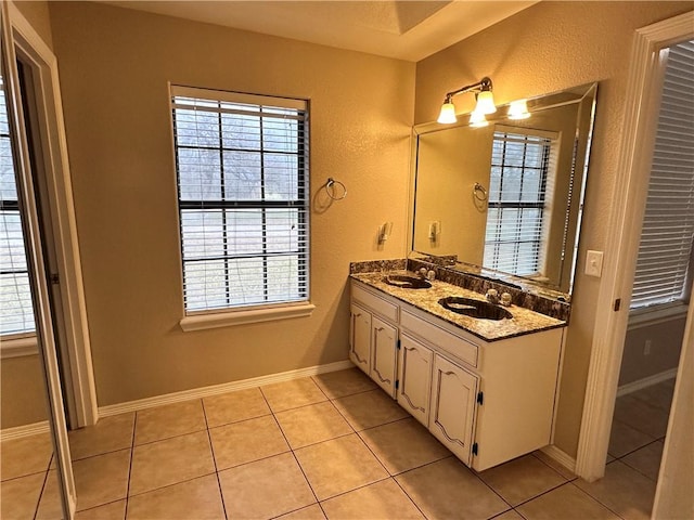 bathroom featuring tile patterned floors and vanity