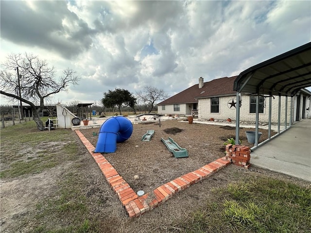 view of yard featuring a playground