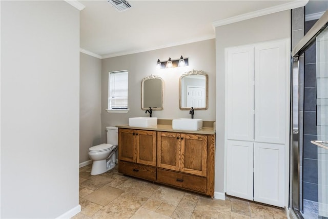 3658 Castle River Dr, Corpus Christi, TX 78410 - full bathroom featuring double vanity, tiled shower, crown molding, and stone finish floors