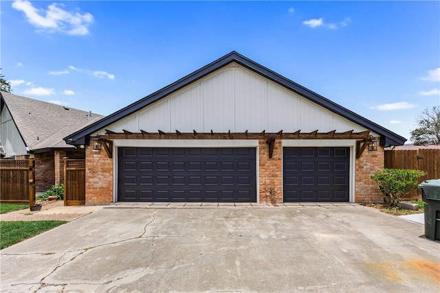 3658 Castle River Dr, Corpus Christi, TX 78410 - view of front of home with an attached garage, concrete driveway, and brick siding