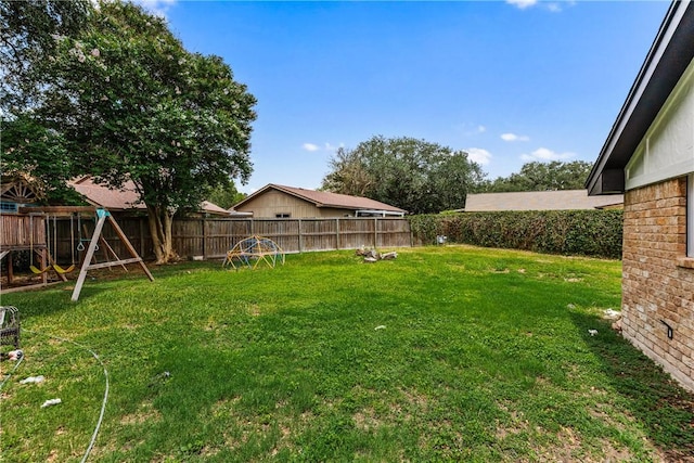 3658 Castle River Dr, Corpus Christi, TX 78410 - fenced backyard featuring a playground