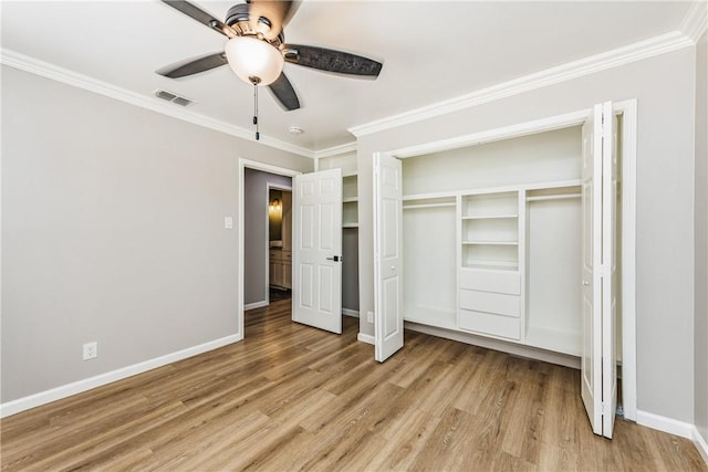 3658 Castle River Dr, Corpus Christi, TX 78410 - unfurnished bedroom with light wood-style flooring, crown molding, a closet, and a ceiling fan