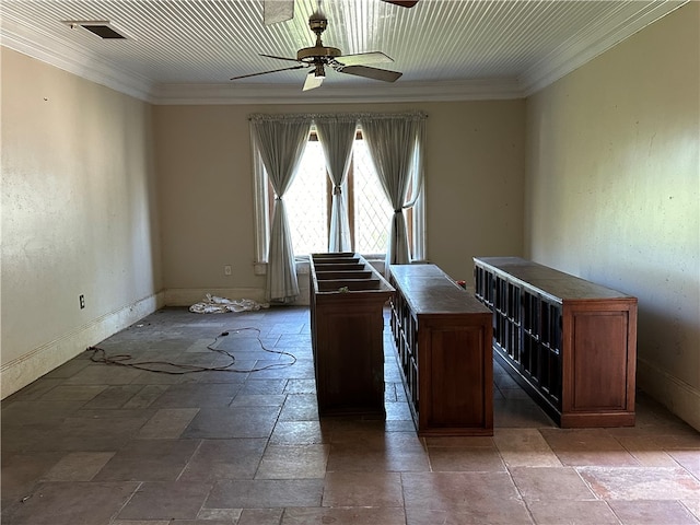 unfurnished office featuring ceiling fan and crown molding