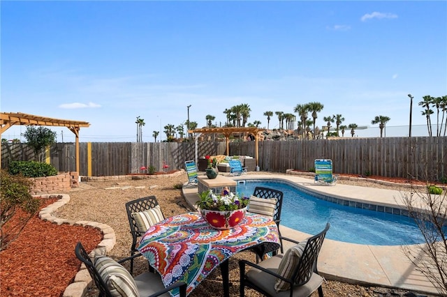 view of pool with a patio area and a pergola