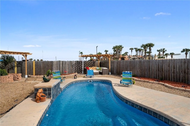 view of swimming pool featuring a pergola, pool water feature, and a patio