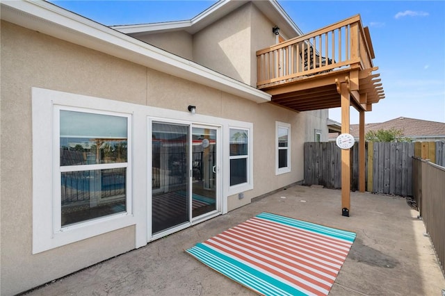 view of patio with a balcony