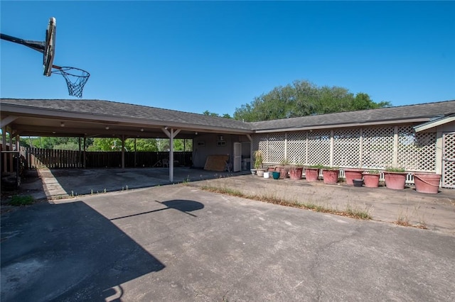 14733 Red River Dr, Corpus Christi, TX 78410 - view of parking with fence and aphalt driveway