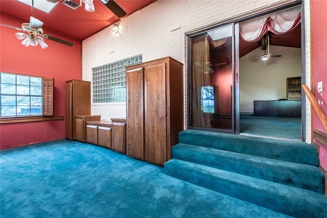 14733 Red River Dr, Corpus Christi, TX 78410 - stairway with visible vents, ceiling fan, high vaulted ceiling, and carpet flooring