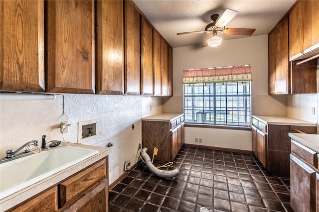 14733 Red River Dr, Corpus Christi, TX 78410 - washroom featuring hookup for a washing machine, a ceiling fan, hookup for an electric dryer, gas dryer hookup, and cabinet space
