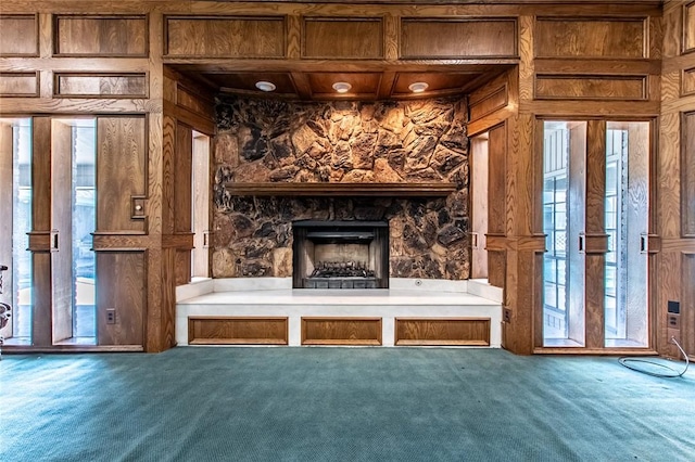 14733 Red River Dr, Corpus Christi, TX 78410 - mudroom with wood walls, carpet flooring, and a fireplace