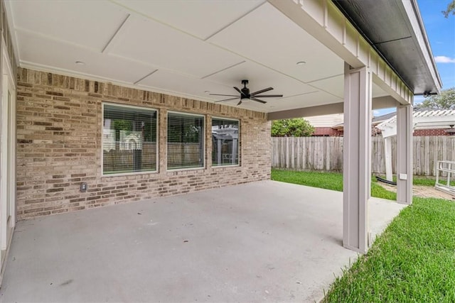 7025 Ashdown Dr, Corpus Christi, TX 78413 - fenced backyard featuring ceiling fan and a patio