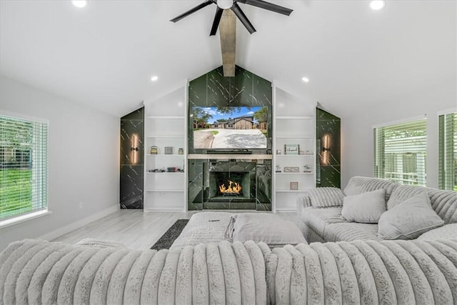 7025 Ashdown Dr, Corpus Christi, TX 78413 - living area featuring ceiling fan, wood finished floors, a premium fireplace, and recessed lighting