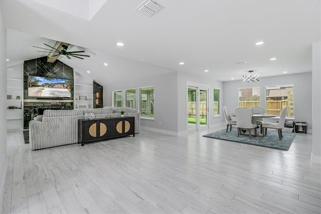 7025 Ashdown Dr, Corpus Christi, TX 78413 - living room featuring recessed lighting, baseboards, wood finished floors, a chandelier, and lofted ceiling