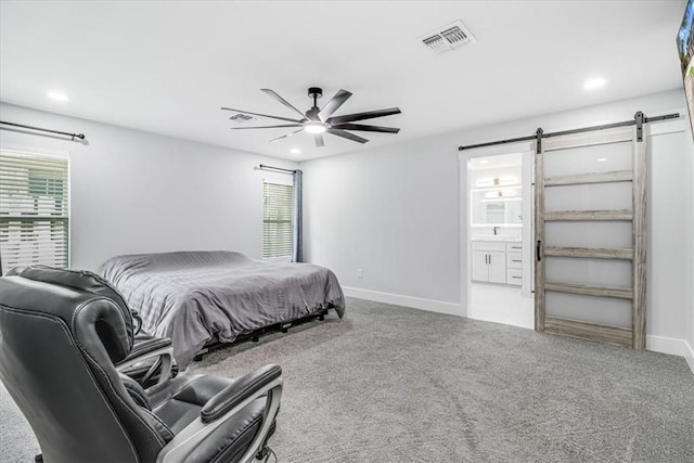 7025 Ashdown Dr, Corpus Christi, TX 78413 - carpeted bedroom with a barn door, recessed lighting, multiple windows, baseboards, and ceiling fan