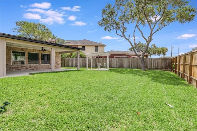 7025 Ashdown Dr, Corpus Christi, TX 78413 - view of yard with a ceiling fan, a patio area, and a pergola