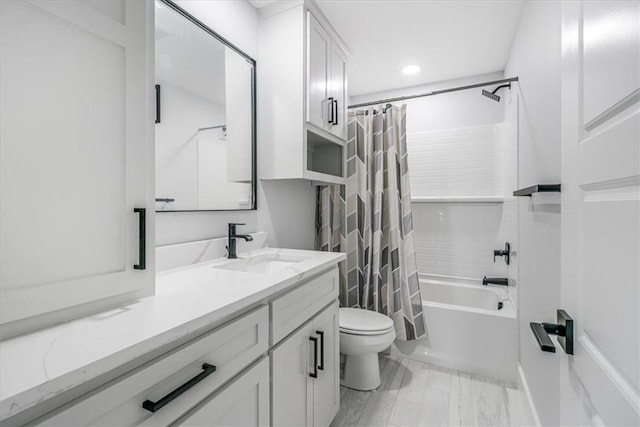 7025 Ashdown Dr, Corpus Christi, TX 78413 - full bath featuring vanity, toilet, shower / bath combo with shower curtain, and recessed lighting
