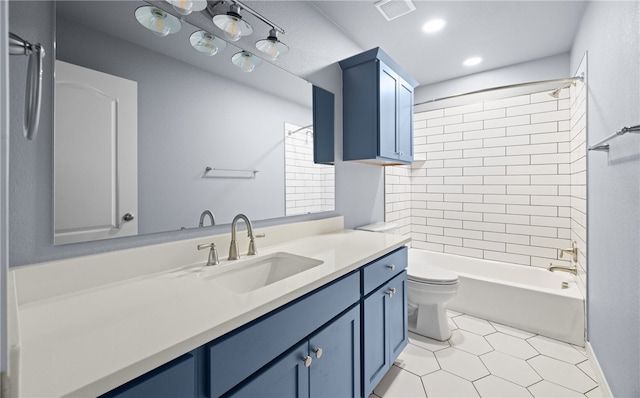 bathroom featuring shower / tub combination, toilet, vanity, visible vents, and tile patterned floors