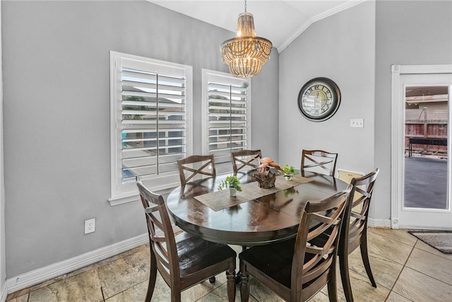 13901 Laffite Dr, Corpus Christi, TX 78418 - dining space with a chandelier, lofted ceiling, and ornamental molding