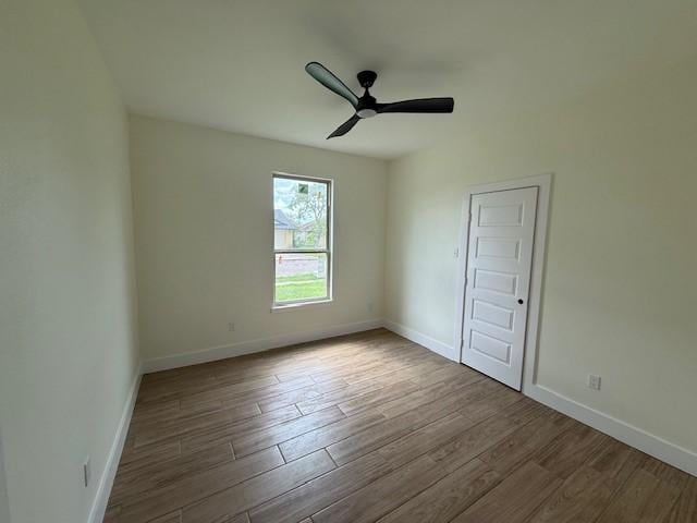 2761 Camargo Dr, Corpus Christi, TX 78415 - empty room featuring wood finished floors and a ceiling fan