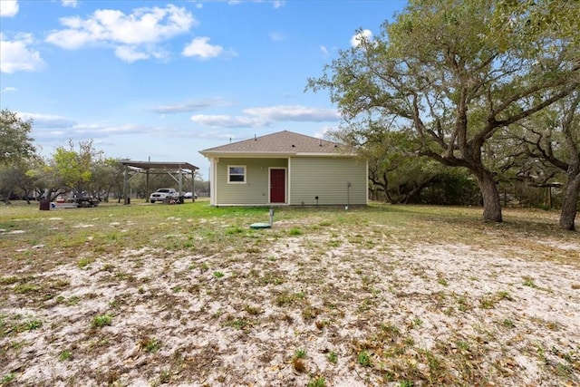 1818 16th St, Rockport, TX 78382 - back of property featuring a carport