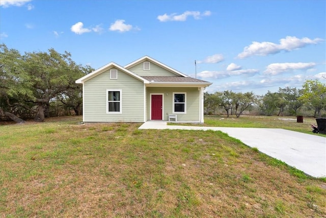 1818 16th St, Rockport, TX 78382 - view of front of home with a front lawn