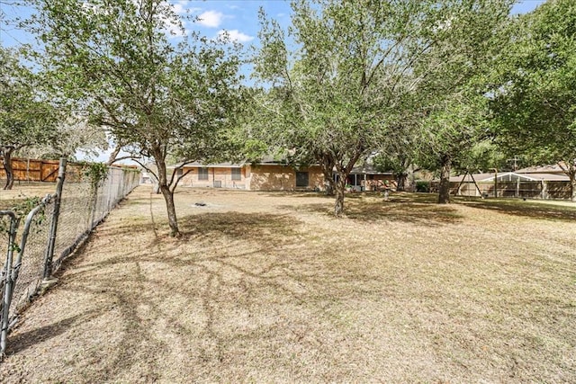 view of yard featuring fence