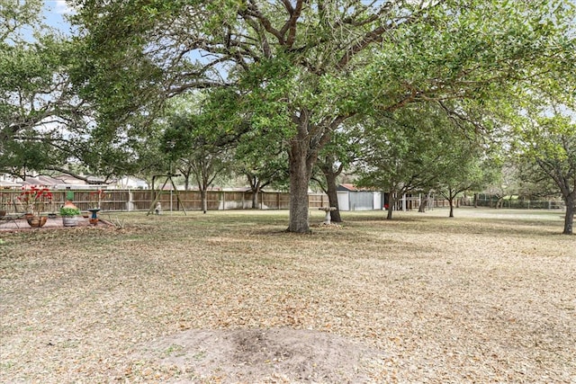 view of yard with fence