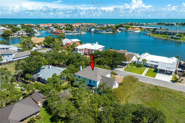 birds eye view of property featuring a water view