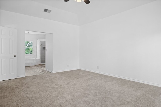 carpeted empty room with ceiling fan