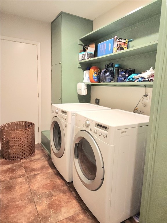 clothes washing area featuring separate washer and dryer