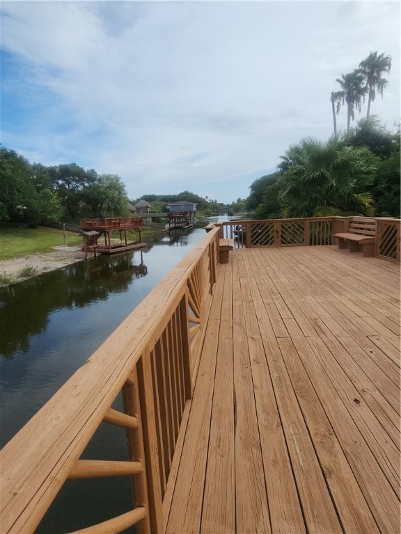 deck featuring a water view