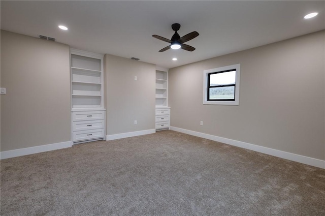 unfurnished bedroom with baseboards, visible vents, carpet flooring, and recessed lighting