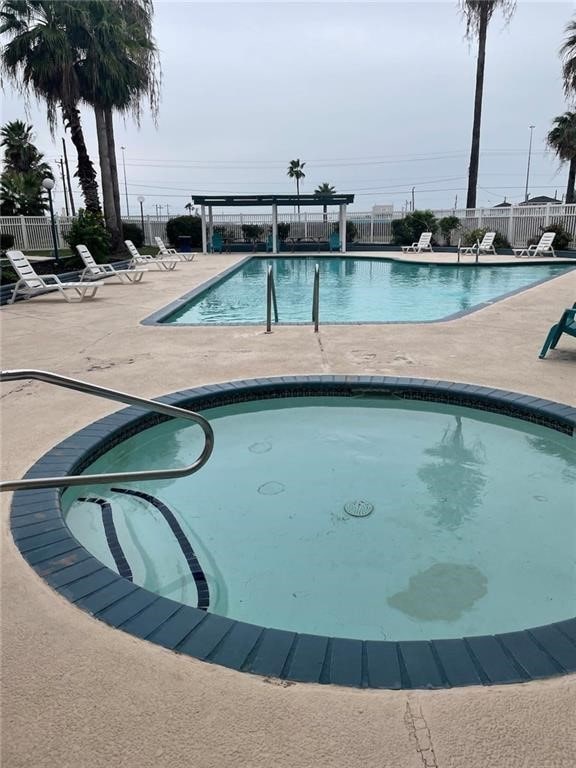 view of swimming pool featuring a patio