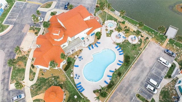 drone / aerial view with a water view