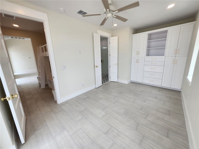 unfurnished bedroom featuring recessed lighting, light wood-type flooring, a ceiling fan, visible vents, and baseboards