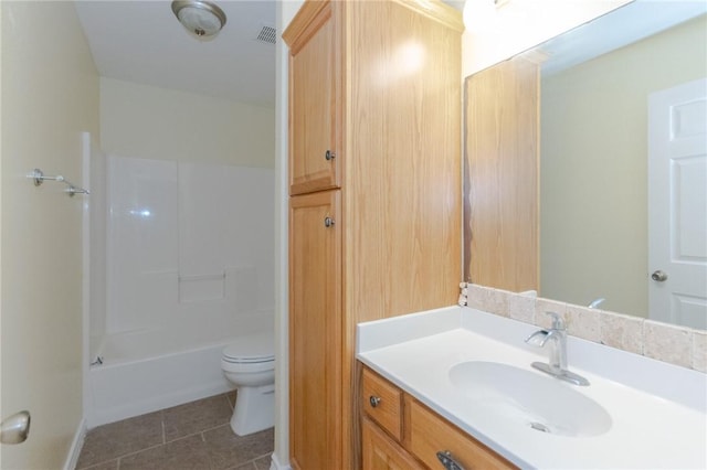 full bathroom featuring tile patterned floors, vanity, shower / bathtub combination, and toilet