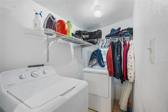 laundry area featuring independent washer and dryer